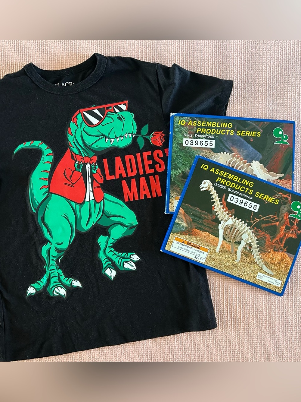 Kids 'Ladies Man' Dinosaur Graphic Tee along with kits